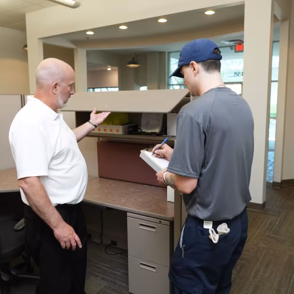 A Leaders Moving & Storage Co. team member works directly with a B2B customer to ensure a smooth and supportive relocation journey